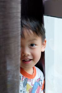 Close-up portrait of smiling girl