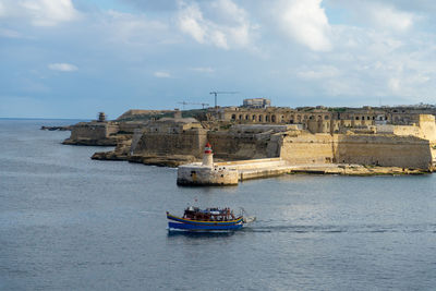 Scenic view of sea against sky valletta port