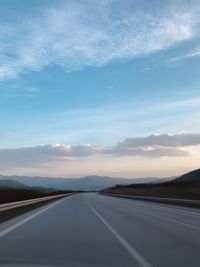 Road against sky during sunset