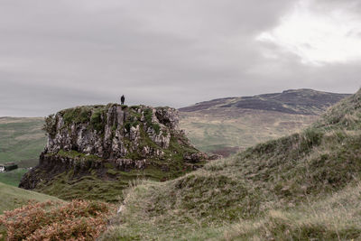 View of a man on the castle ewen inside the fairy glen, september 2019