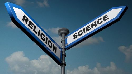 Low angle view of road sign against sky