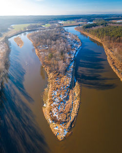 High angle view of sea shore against sky