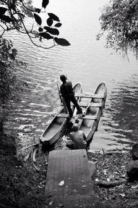 Woman rowing boat in river