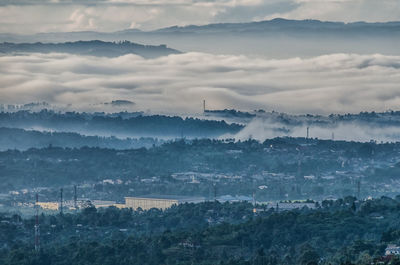 Scenic view of cityscape against sky