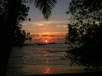 Scenic view of sea at sunset