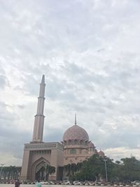 View of building against cloudy sky