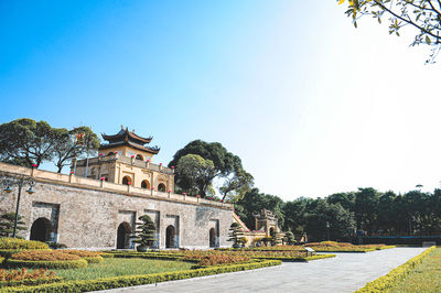 Low angle view of building against clear blue sky