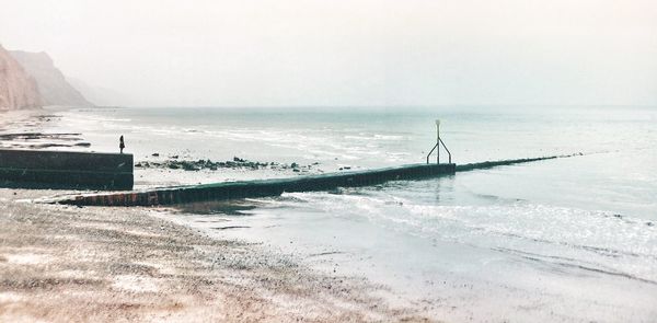 Scenic view of sea against clear sky