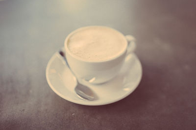 Close-up of coffee cup on table