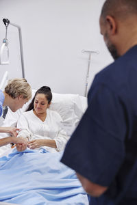 Female patient talking to nurse