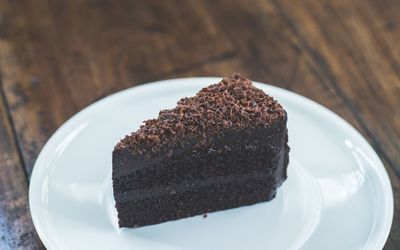 Close-up of chocolate cake in plate on table