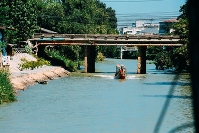 Bridge over river against sky