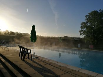 View of swimming pool against clear sky