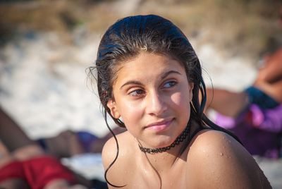 Smiling girl looking away outdoors