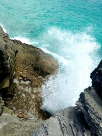 Waves splashing on rocks