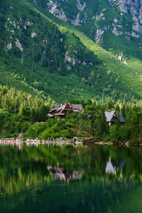 Mountains range near beautiful lake. tatra national park in poland. morskie oko or sea eye lake