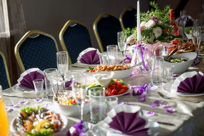 Close-up of food with place setting on table