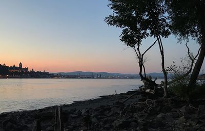 Scenic view of sea against sky at sunset