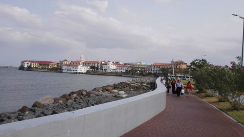 View of buildings against cloudy sky