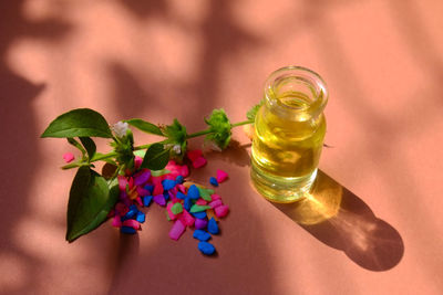 Close-up of spa oil on table