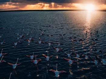 Scenic view of sea against sky during sunset