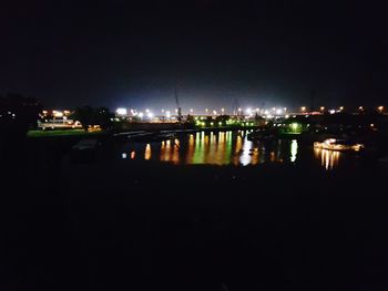 Reflection of illuminated buildings in water