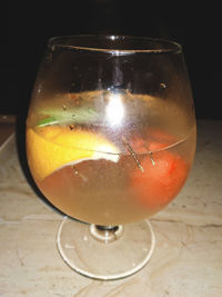 Close-up of wine in glass on table