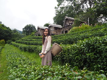 Portrait of young woman at tea plantation