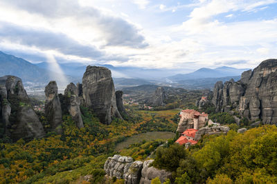 Sun rays in the mountains at the monastery of rousanou, kalabaka, greece