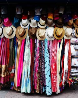 Multi colored headwears displayed for sale in store