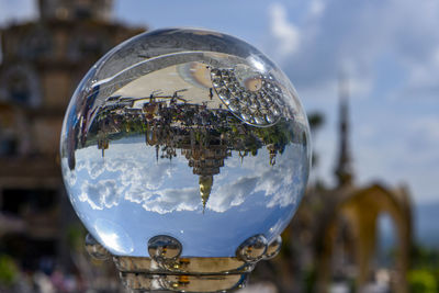 Close-up of crystal ball against water