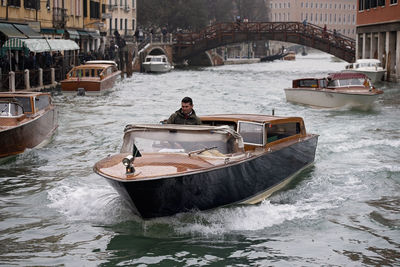 Boat in sea by canal