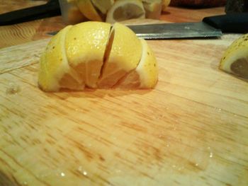 Close-up of orange slice on cutting board