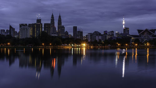 Reflection of illuminated buildings in water