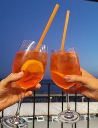 Close-up of hand holding drink