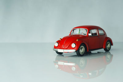 Close-up of toy car against white background