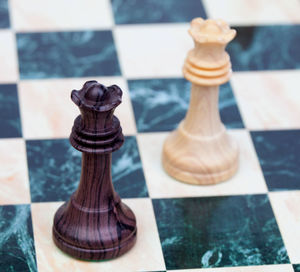 High angle view of chess pieces on table