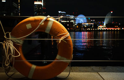  view of illuminated ferris wheel at night