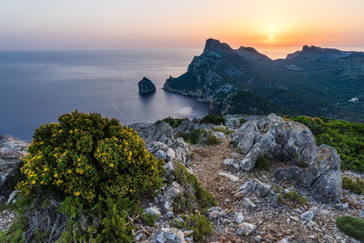 Scenic view of sea against sky during sunset