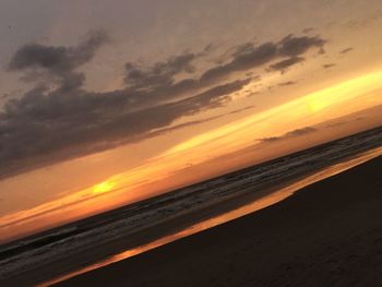 Scenic view of sea at sunset