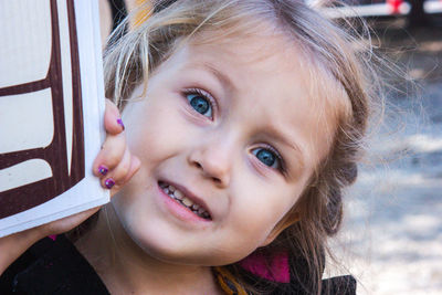 Close-up portrait of cute girl