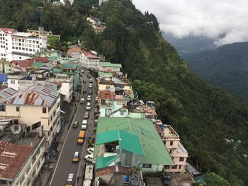 High angle view of buildings in city against sky