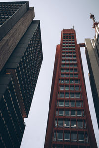 Low angle view of modern buildings against clear sky