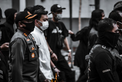 Group of people at market stall