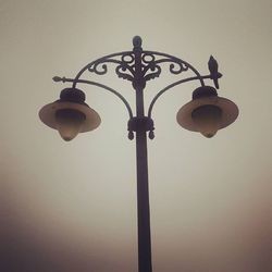 Low angle view of illuminated street light