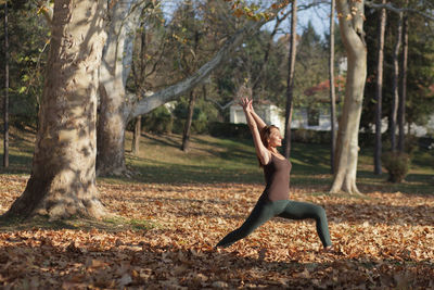 Young woman exercising at park