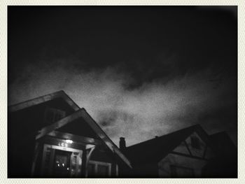 Low angle view of built structure against sky at night