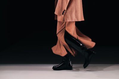 Low section of woman standing on floor