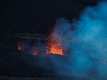 Smoke emitting from volcanic mountain