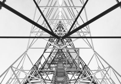 Low angle view of steel structure against sky